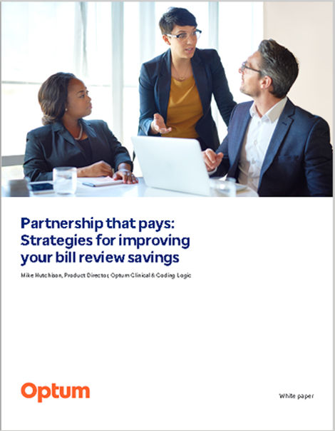 Work team reviewing business on a laptop